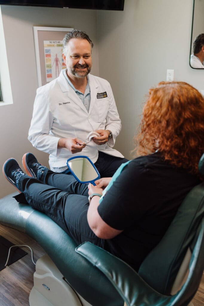 Dr. Henrich with Coweta patient